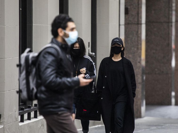 Facial recognition firms are scrambling to see around face masks