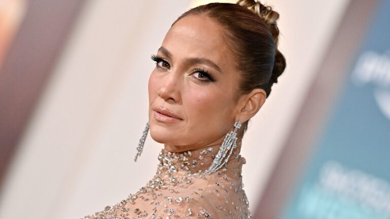 Jennifer Lopez, 54, looks incredible as she showcases bare chest and abs in plunging dress